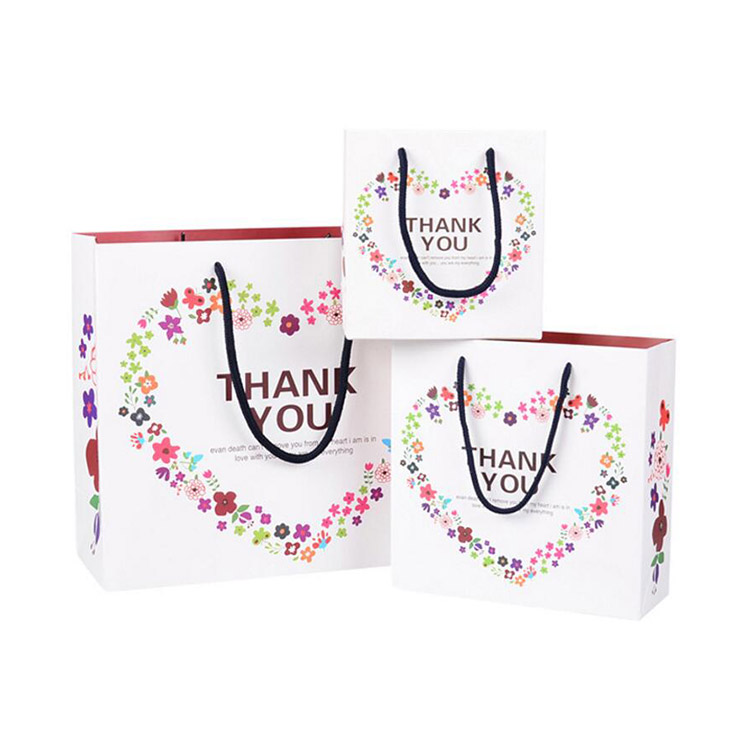 Hvorfor vælge en papirpose med papirhåndtag?